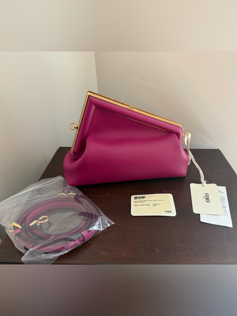 SA rank Fendi First Midi Fuschia Pink Clutch
